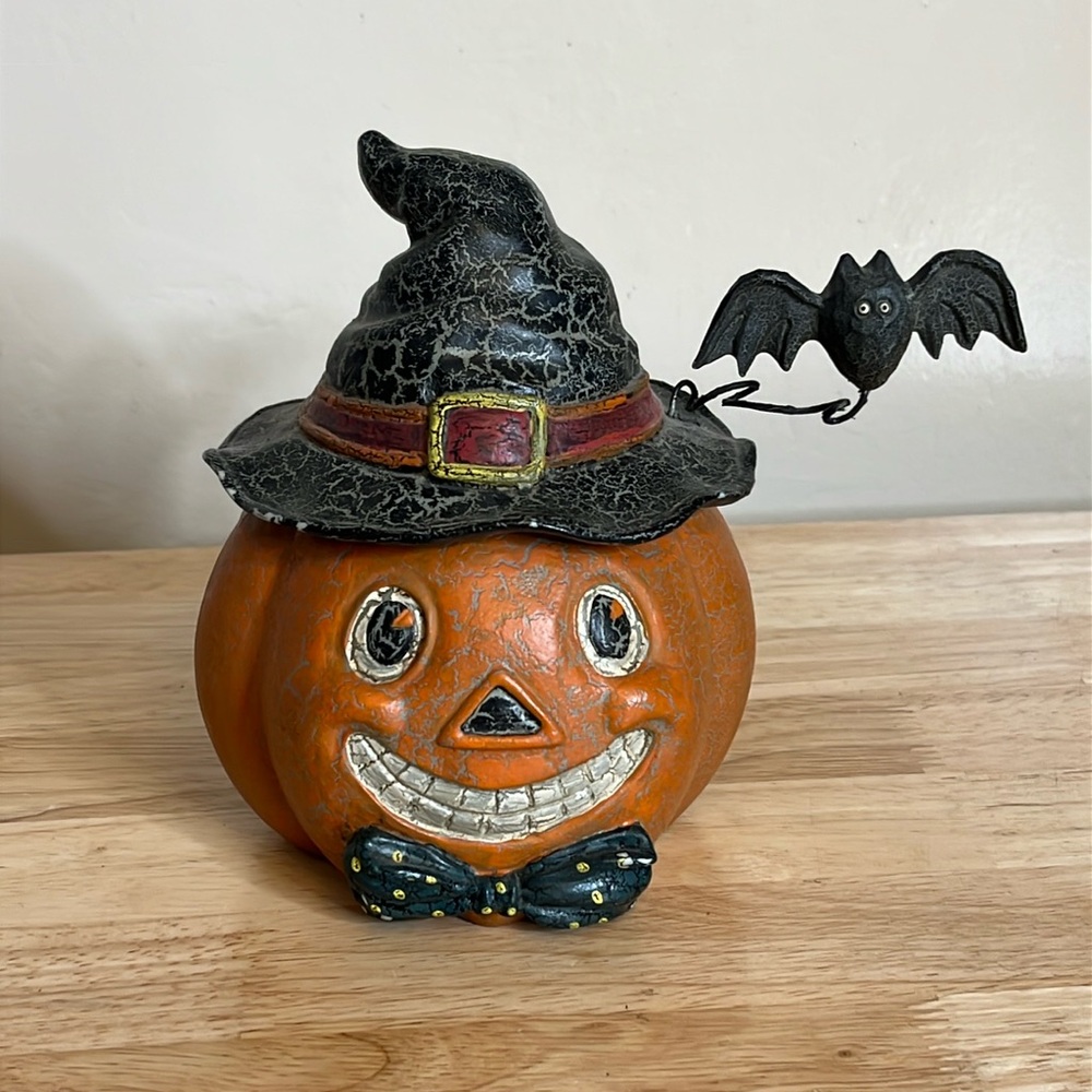 Folk Art Pumpkin jack-o'-lantern wearing a witches hat with bat